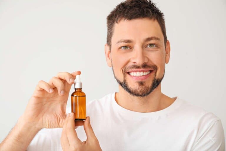 men anti-aging skincare featured image serum hold in hand