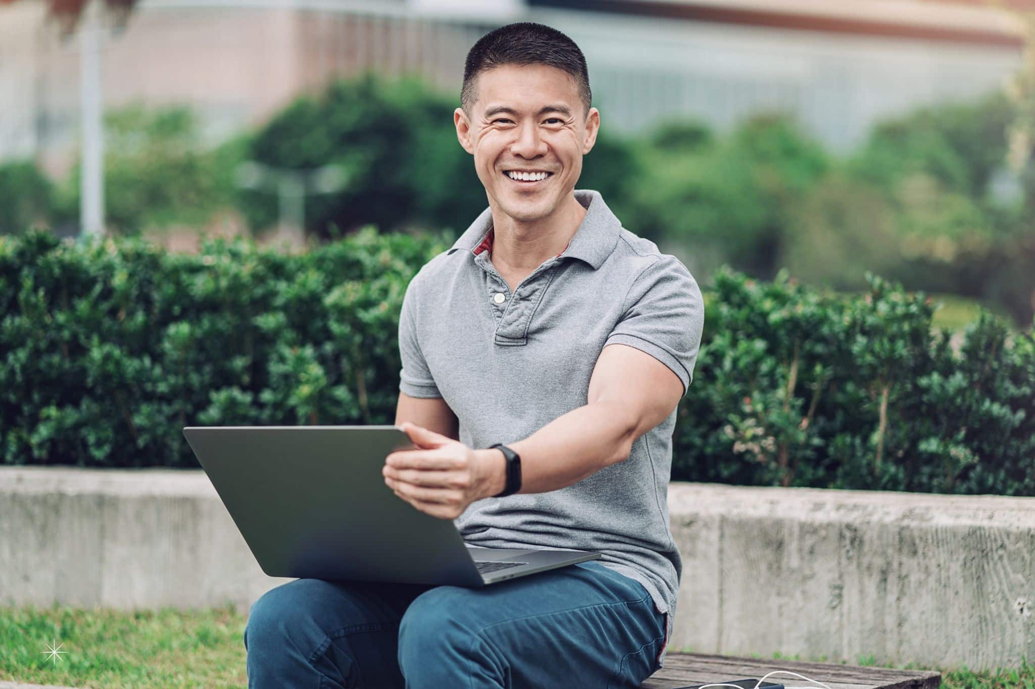 men anti-aging skincare featured image middle aged on laptop